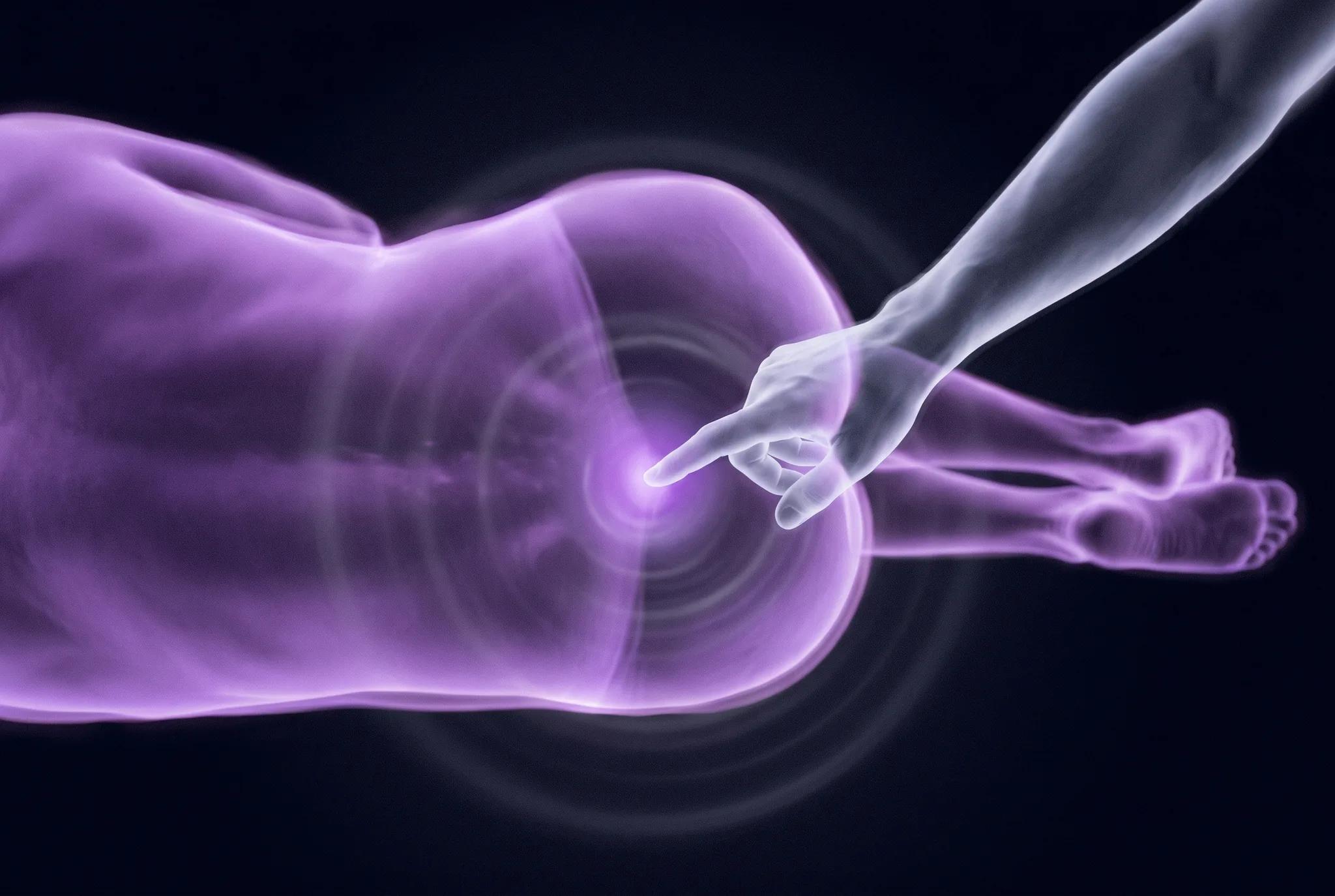 A close view of the hips of a figure of violet light lying on its side, with a pale hand reaching in from the edge of the frame and one extended fingertip resting still against the body, faint concentric rings spreading from where it touches.